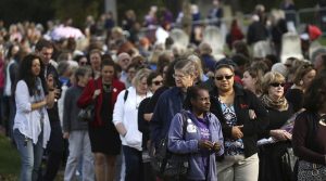 Voters lined up on election day to place "I voted" stickers on the grave of Susan B. Anthony at Mt. Hope Cemetery in Rochester, NY.